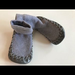 Slippers by Hanna Andersson.